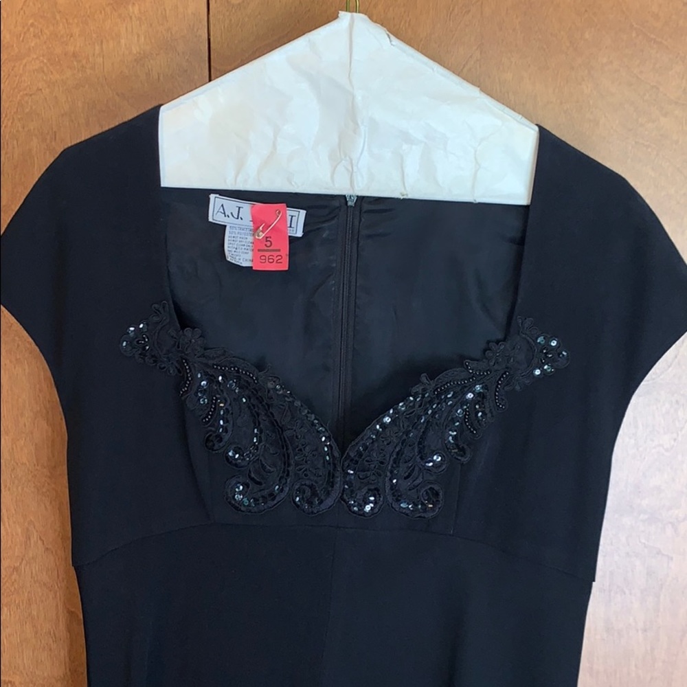 EUC Women’s black cocktail dress - size 12.